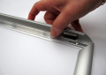 Clip Open to insert poster.
